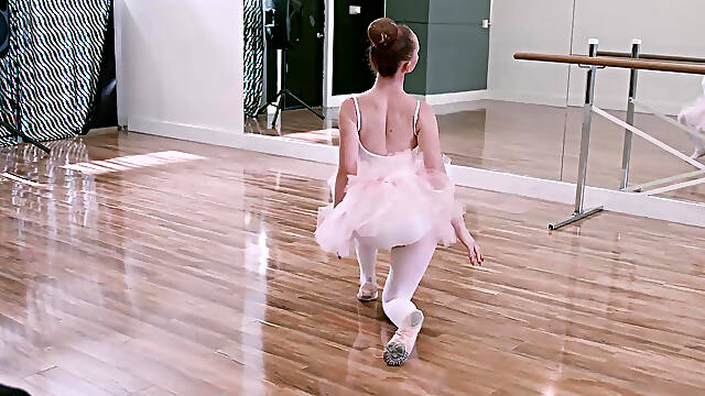 World class ballerina Athena Rayne slides up and down judges pole