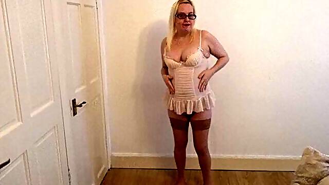 Sexy striptease in Tan stockings